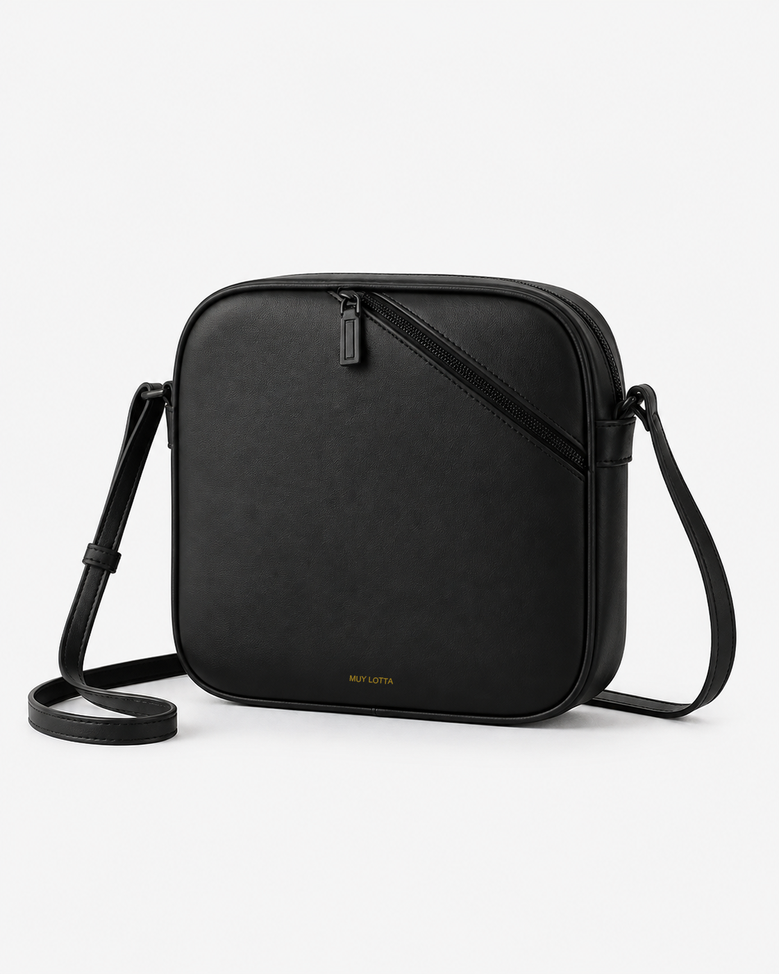 MUYLOTTA ML-CB01 black crossbody bag, three-quarter view, with a diagonal offset zipper and slim strap.