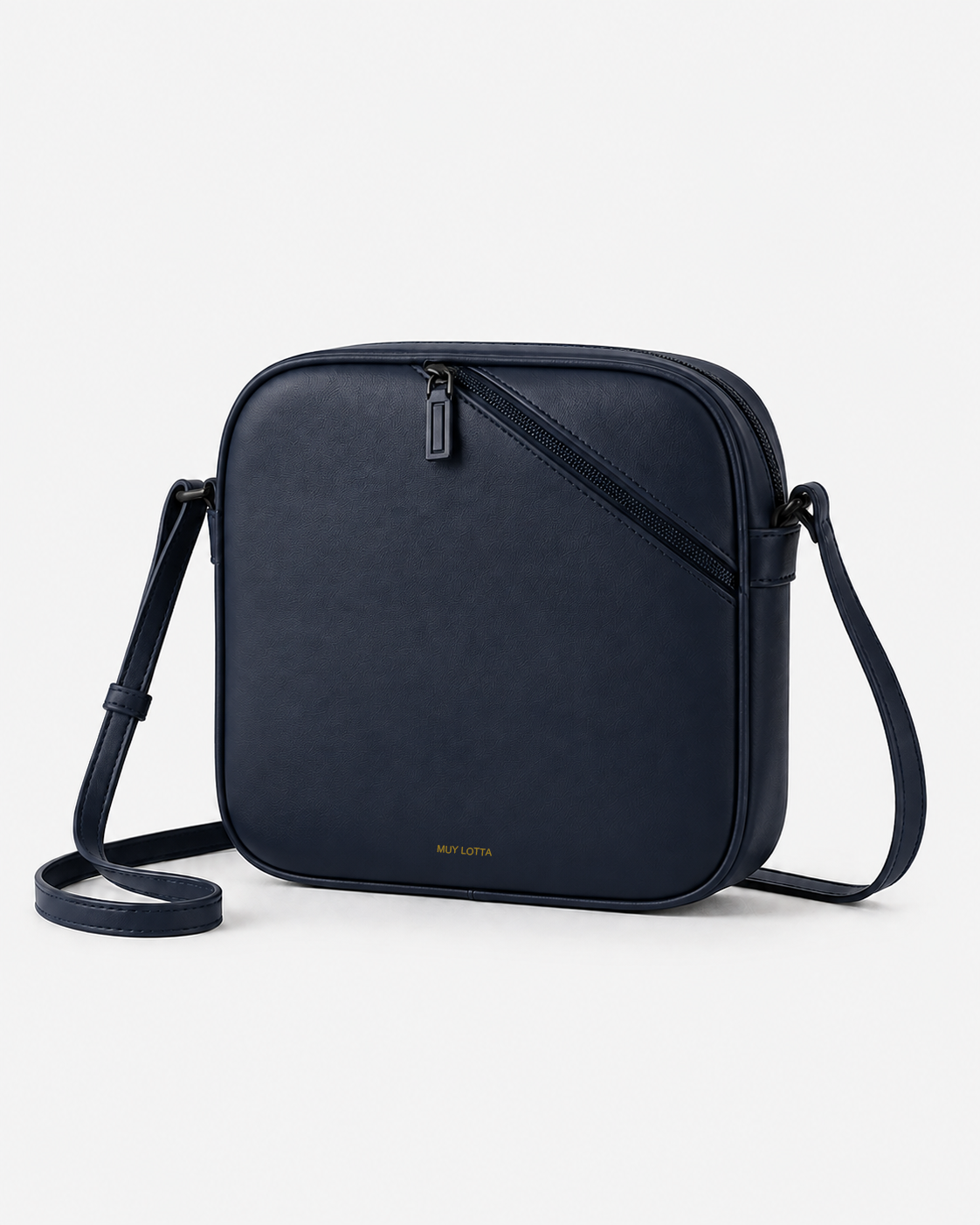 MUYLOTTA ML-CB01 ink navy crossbody bag, three-quarter view, with a diagonal offset zipper and slim strap.