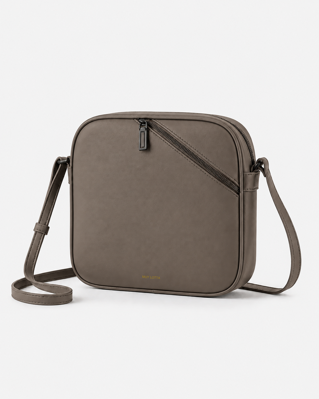 MUYLOTTA ML-CB01 taupe crossbody bag, three-quarter view, with a diagonal offset zipper and slim strap.