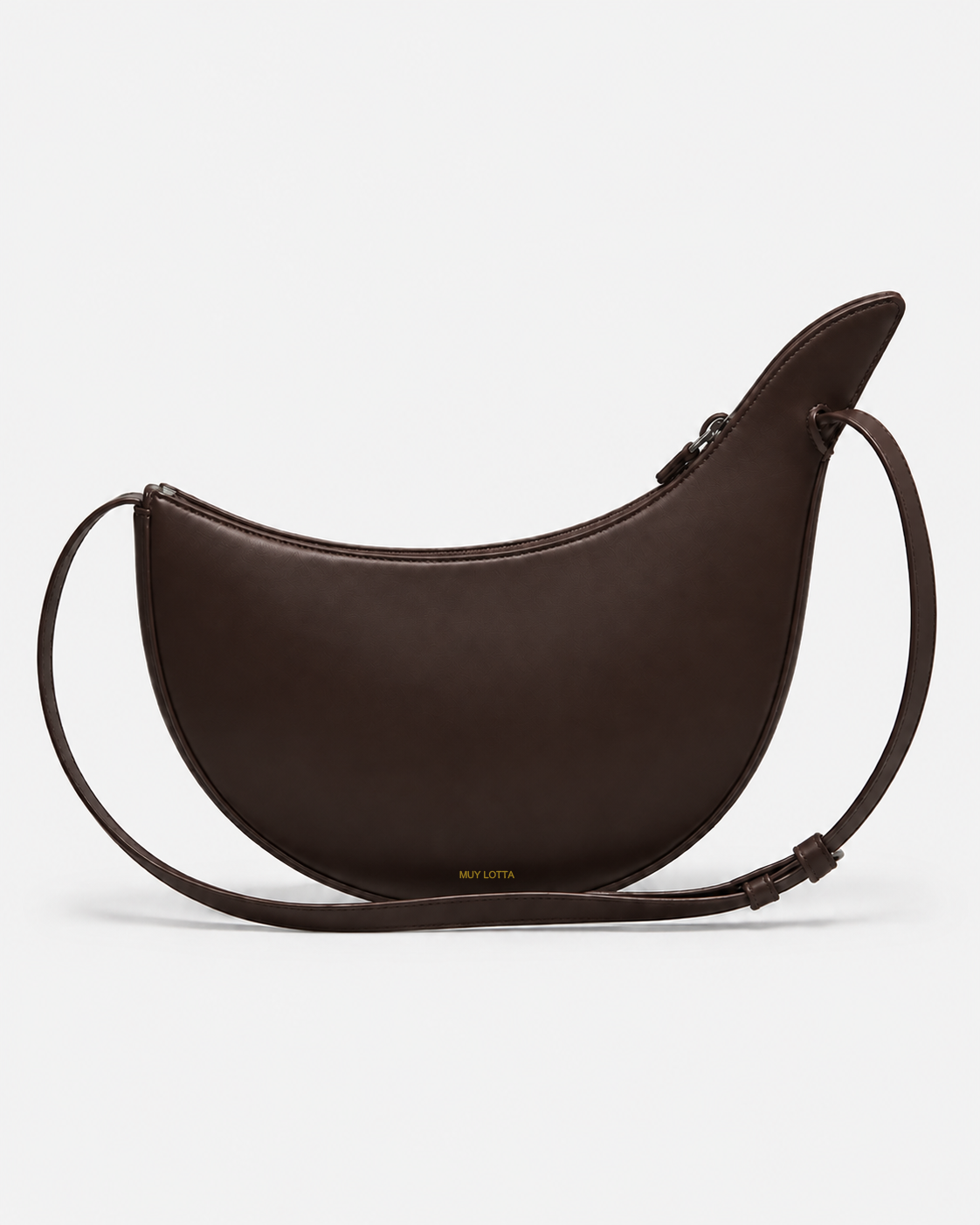 MUYLOTTA ML-CB03 deep brown crescent crossbody bag, three-quarter view, with one raised side wing and a slim strap.