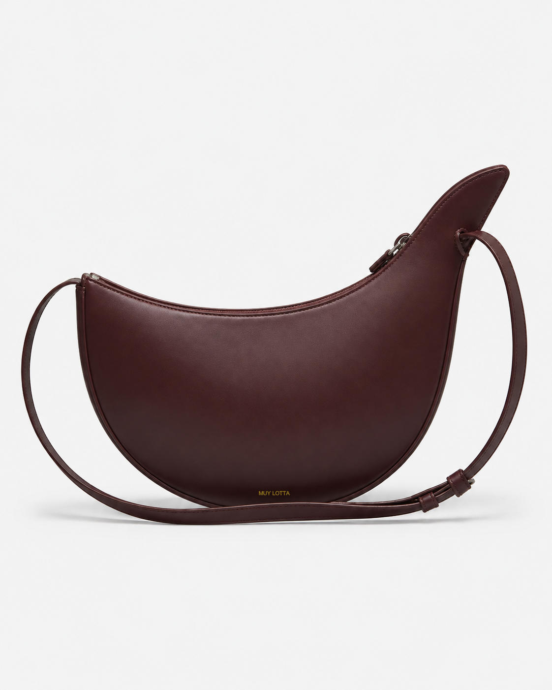 MUYLOTTA ML-CB03 oxblood crescent crossbody bag, three-quarter view, with one raised side wing and a slim strap.