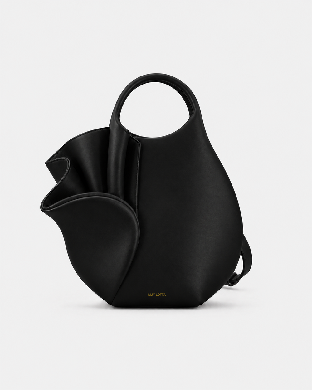 MUYLOTTA ML-MN05 black sculptural mini bag, three-quarter view, with a ring handle and one outward-folded side panel.