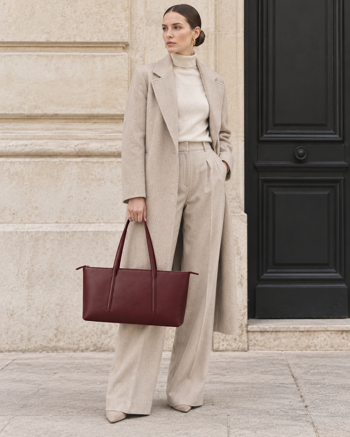 Woman carries the oxblood MUYLOTTA ML-TT02 east-west tote in a second styling view.