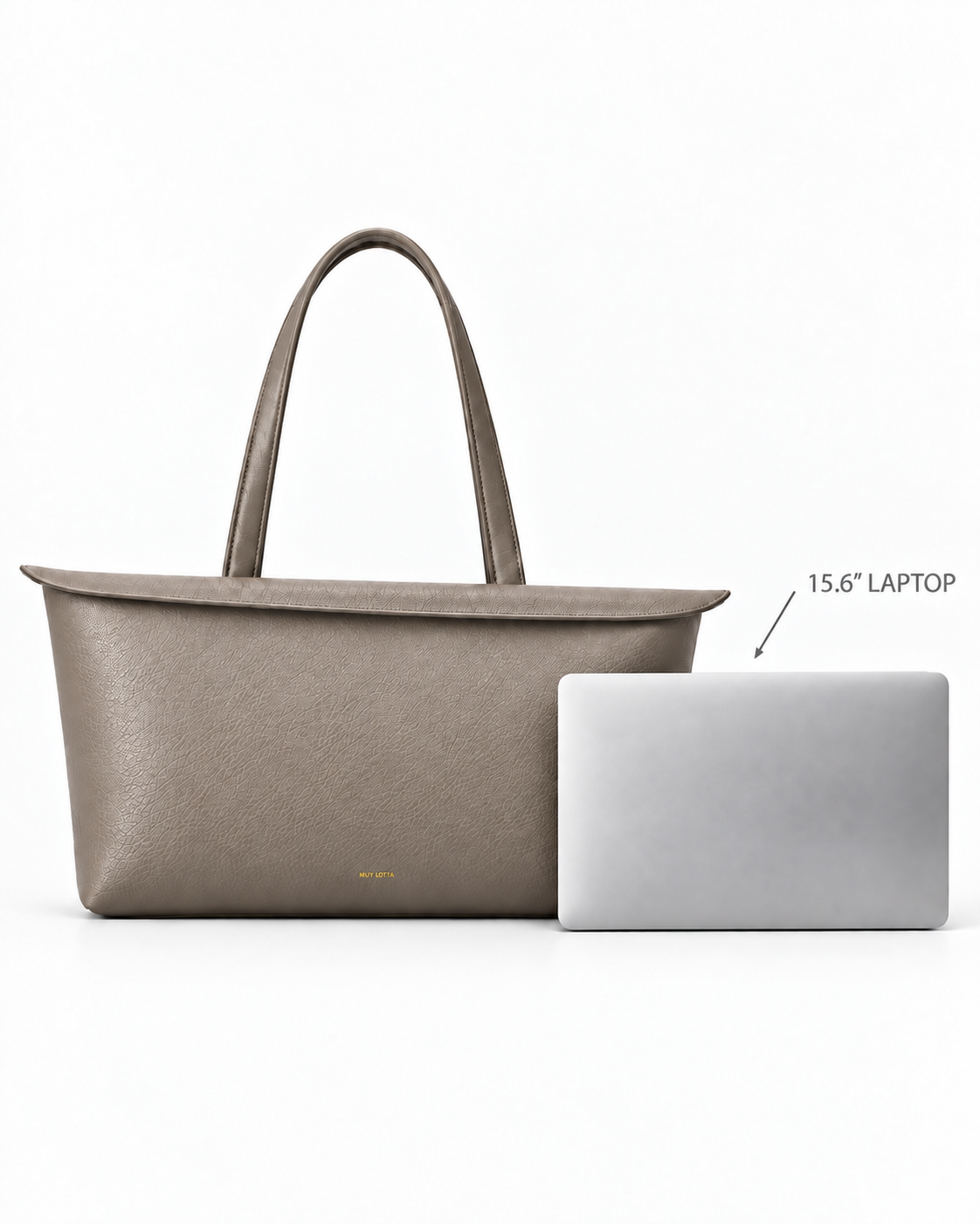 MUY LOTTA Floating Eave Span Limestone Taupe tote shown beside a 15.6-inch laptop for scale.