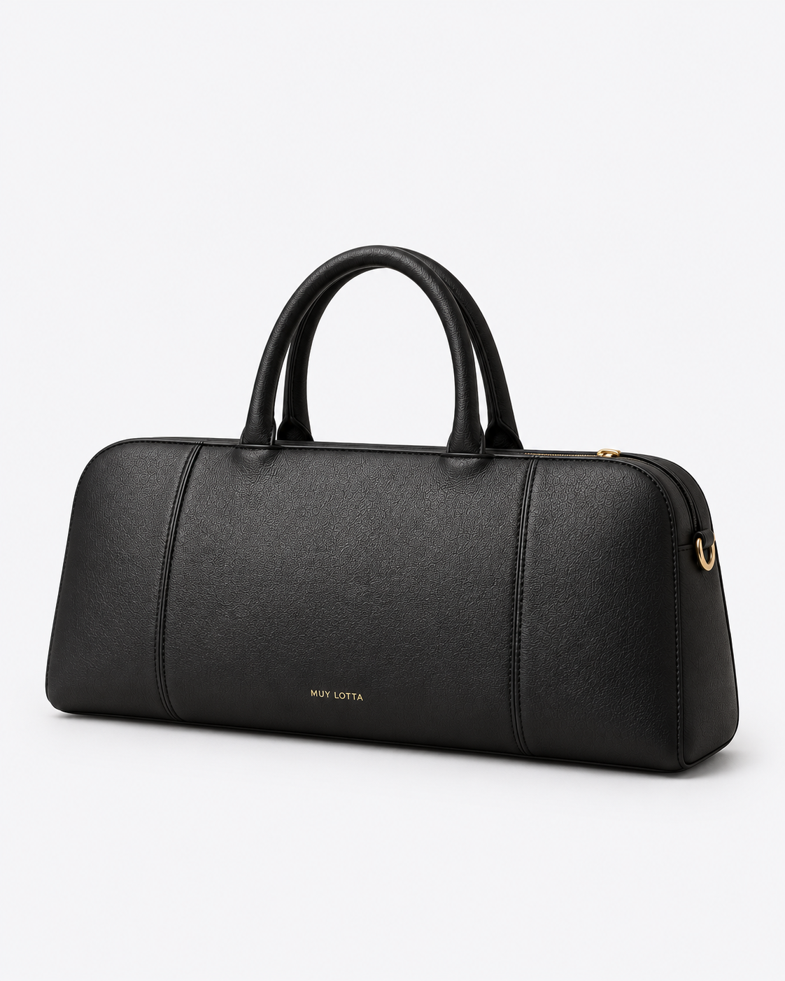 Three-quarter view of the black MUY LOTTA baguette bag showing its structured profile and gold-tone hardware.