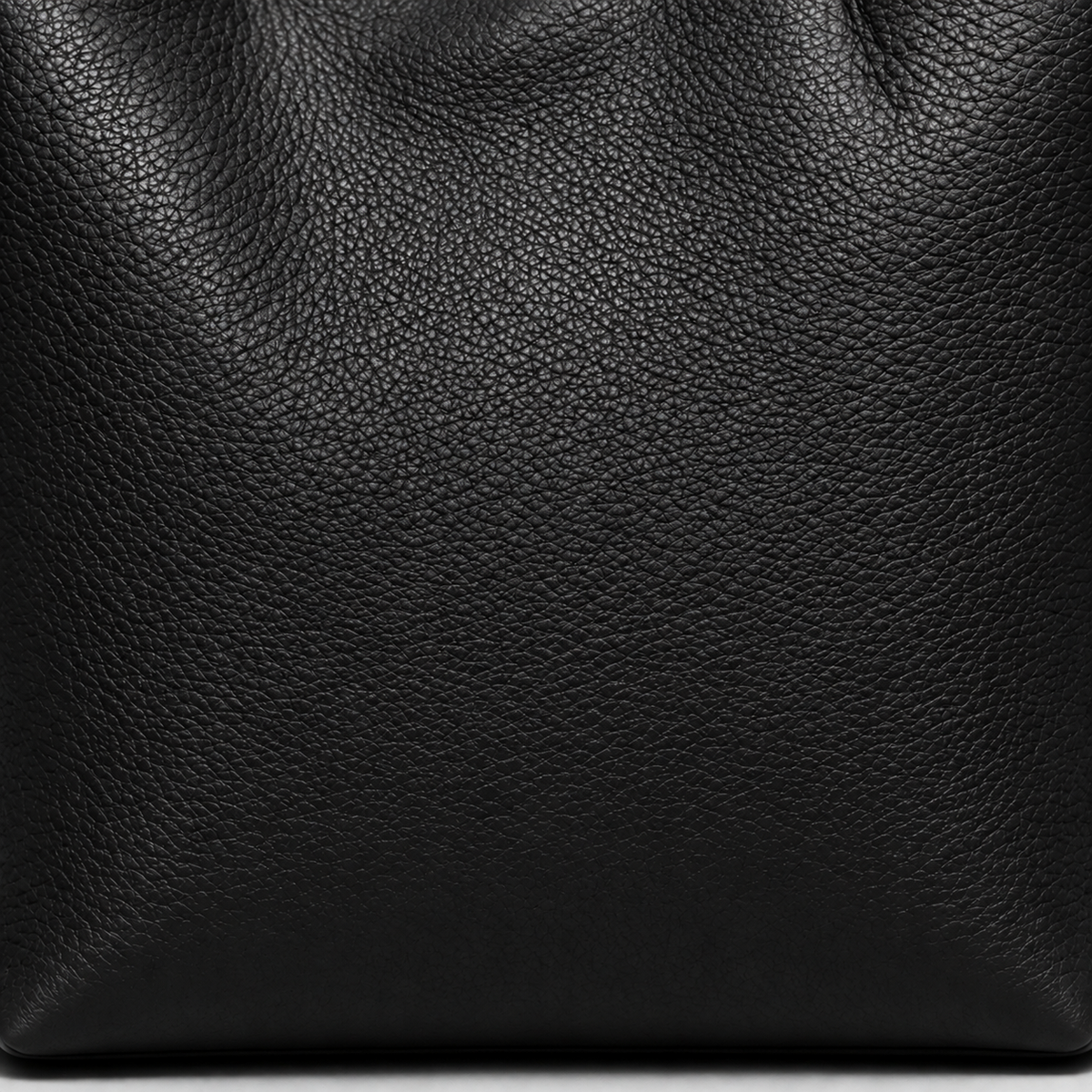 Close-up of the fine-grain Black surface of the MUY LOTTA VEER Axis tote.